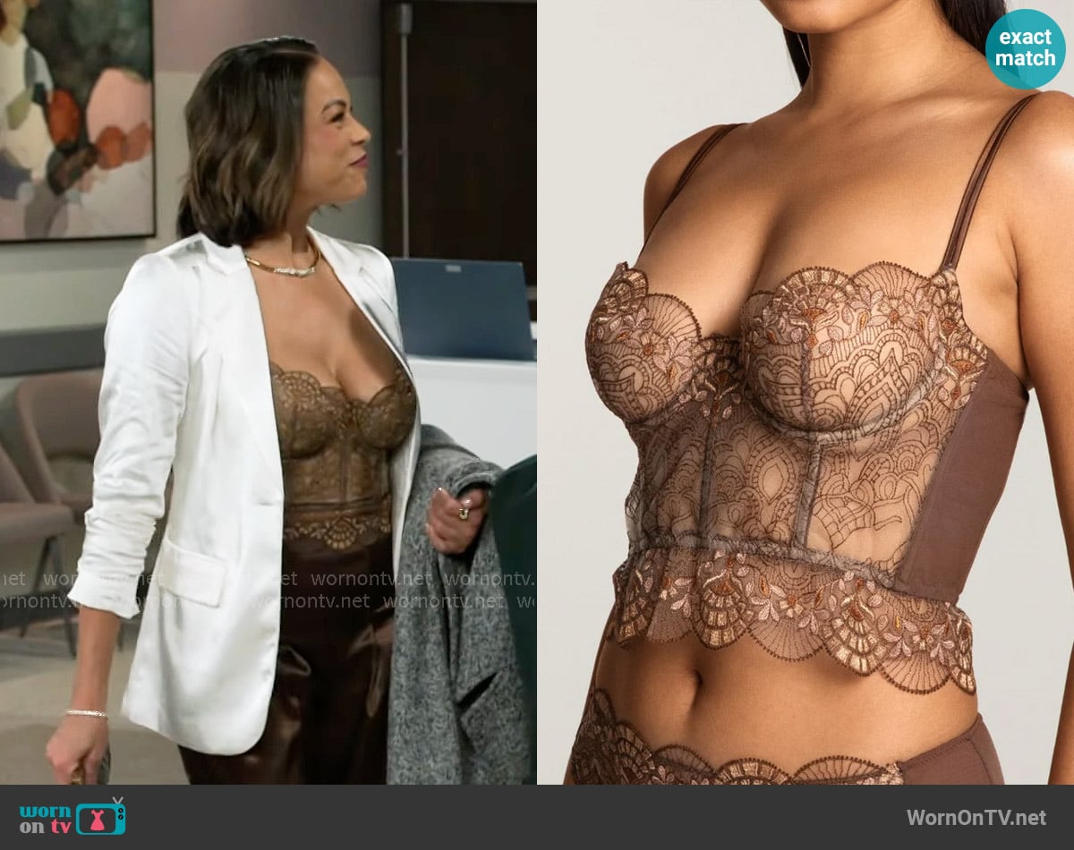 Nicole’s lace bustier top on Beyond the Gates