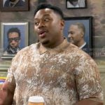 Marty’s brown printed polo shirt on The Neighborhood