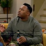 Marty’s olive green sweatshirt on The Neighborhood