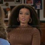 Eva’s brown lace top on Beyond the Gates