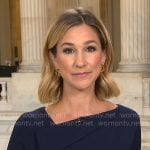 Caitlin Huey-Burns’ navy asymmetric neckline dress on CBS Mornings