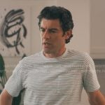 Lev’s blue striped t-shirt on Running Point