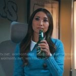 Ali's blue sweater on Running Point