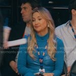 Isla's blue dress with leather waist on Running Point