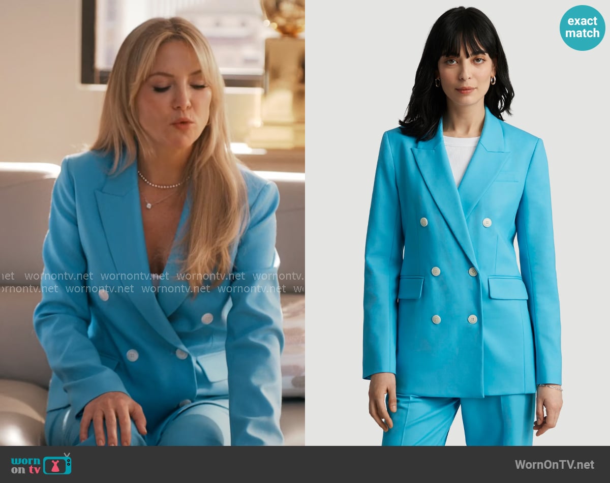 Isla’s bright blue suit on Running Point