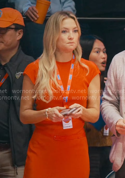 Isla’s red cap-sleeve belted drses on Running Point