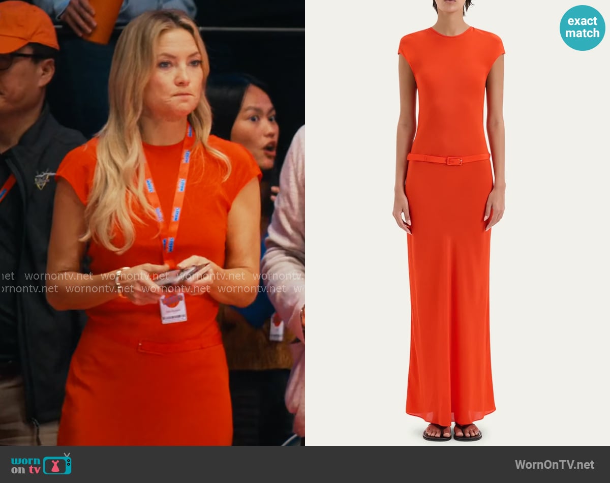 Isla’s red cap-sleeve belted drses on Running Point