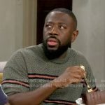 Malcolm’s green striped mesh t-shirt on The Neighborhood