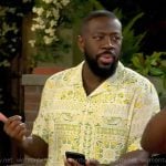 Malcolm’s yellow and green printed shirt on The Neighborhood