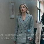 Isla’s houndstooth strapless top and suit on Running Point