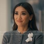 Ali's grey cardigan with flower applique on Running Point