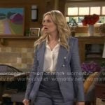 Gemma’s blue suit with silver buttons on The Neighborhood