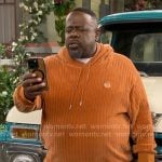 Calvin’s orange chenille hoodie and pants set on The Neighborhood