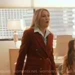 Isla’s dark red suit on Running Point