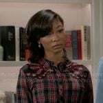 Jessica’s red plaid embroidered shirt and studded skirt on Beyond the Gates