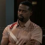 Ted’s beige check polo on Beyond the Gates