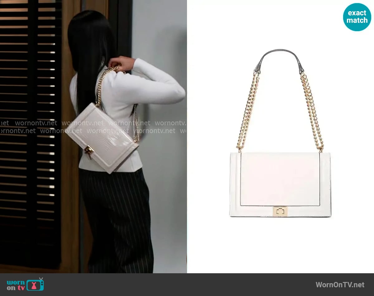 INC International Concepts Ajae Flap Crossbody in Bone Croco/Gold worn by Caroline Lee (Ellie Wang) on Beyond the Gates