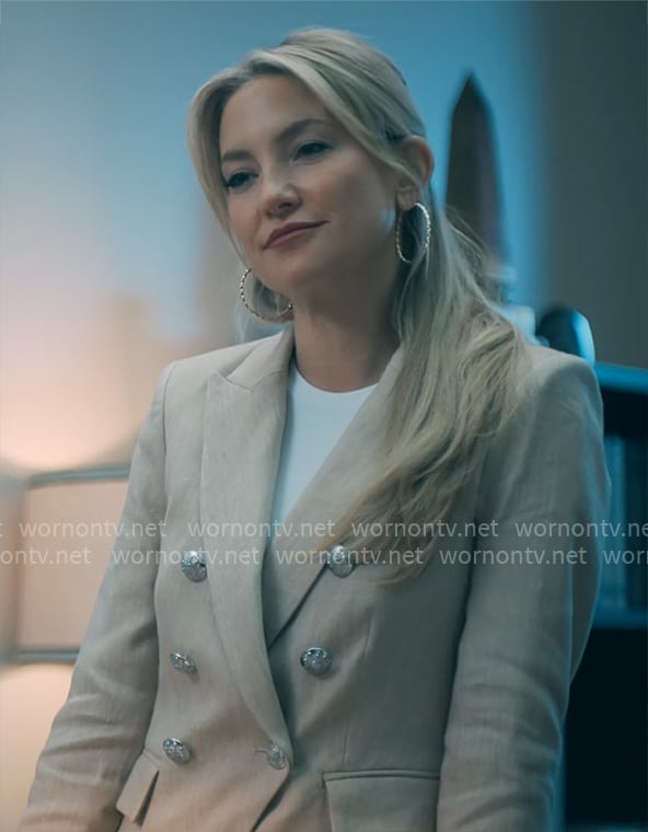 Isla's beige blazer with silver buttons on Running Point (flashback)