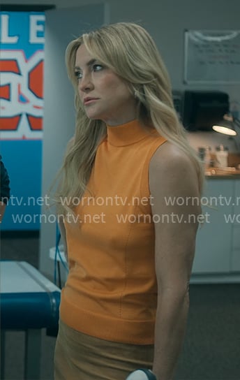 Isla's orange sleeveless knit top on Running Point