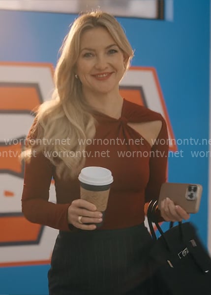 Isla's red long sleeved top with cutout on Running Point