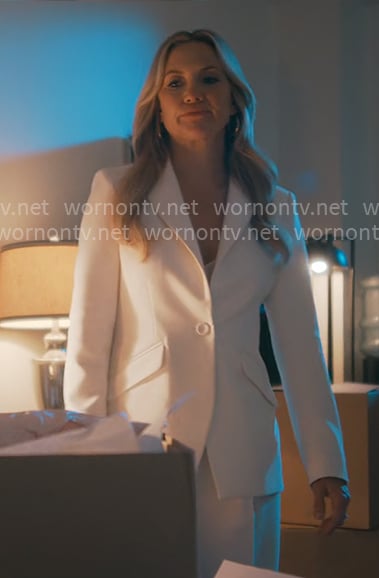 Isla’s white suit on Running Point