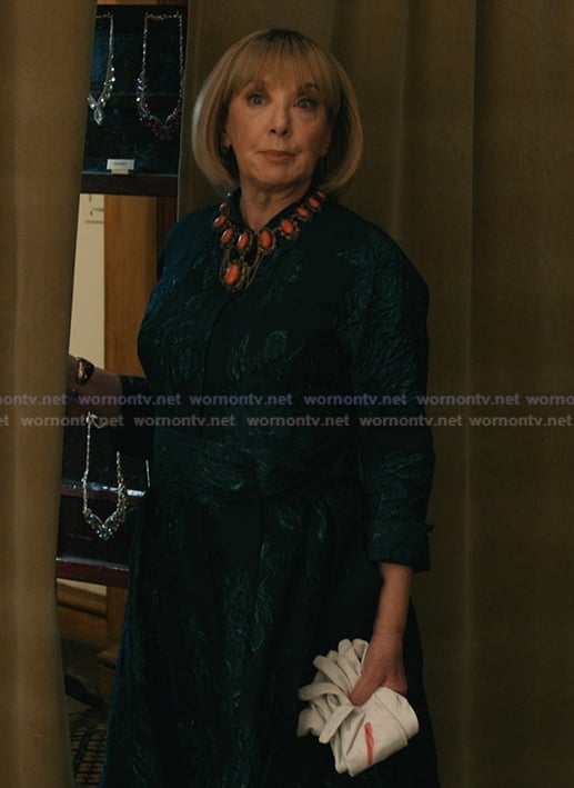 Izzy’s teal floral shirtdress on Elsbeth