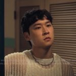 Jin's white open knit sweater on XO Kitty