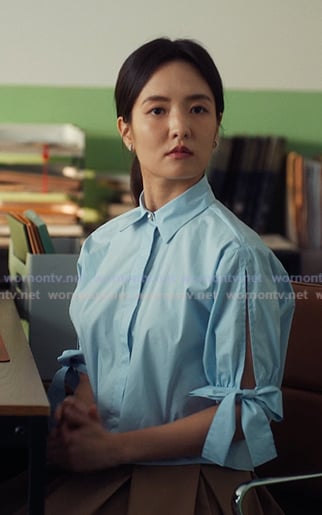 Jiwon’s blue tie sleeve shirt on XO Kitty