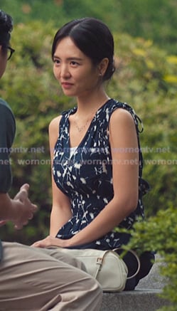 Jiwon’s navy floral v-neck top on XO Kitty