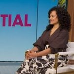 Judy Reyes's brown blouse and ivory floral skirt on Good Morning America