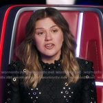 Kelly’s black grommet mini dress on The Voice
