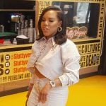 Kelli’s striped lace-up top and skirt on The Real Housewives of Atlanta