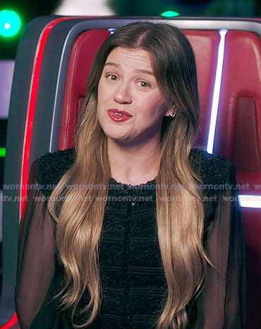 Kelly’s black sheer sleeve top on The Voice