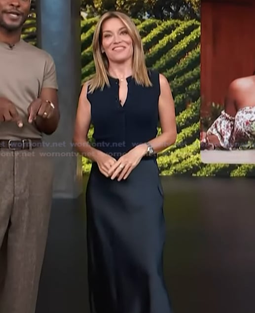 Kit’s navy vest and satin skirt on Access Hollywood