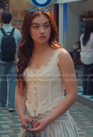 Kitty's white eyelet top and striped mini skirt on XO Kitty