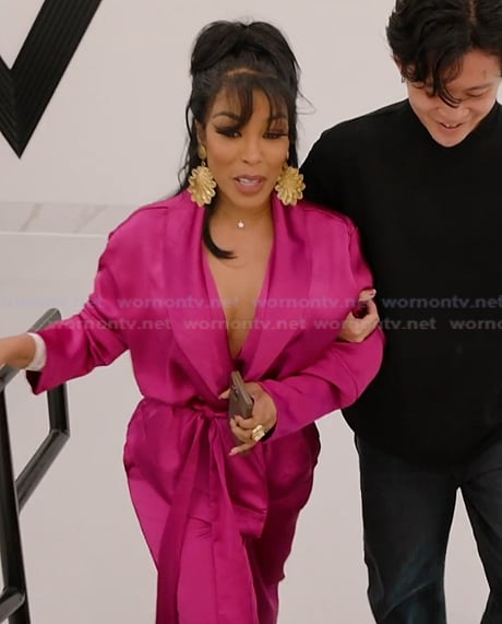 K's pink satin wrap top and pants on The Real Housewives of Atlanta