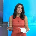 Liz’s orange vest and pants on Today