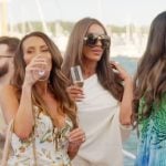 Liz’s white one shoulder jumpsuit on The Real Housewives of Rhode Island