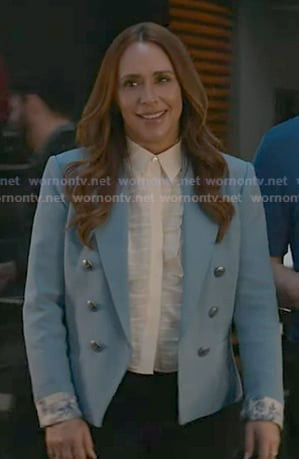 Maddie's white ruffle front top and blue blazer on 9-1-1