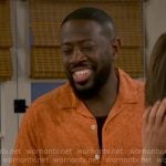 Malcolm’s orange printed shirt on The Neighborhood