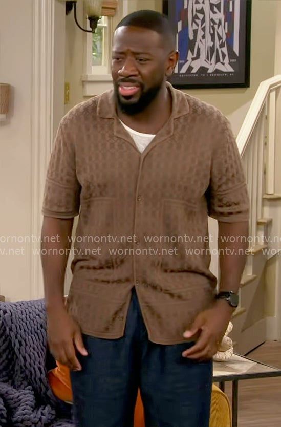 Malcolm’s olive green printed button down shirt on The Neighborhood