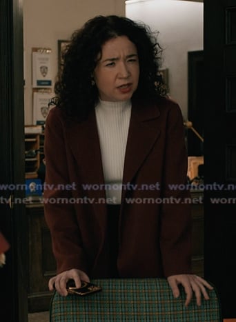 Marisa's burgundy blazer on Elsbeth