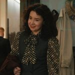 Marissa’s black printed tie neck blouse on Elsbeth