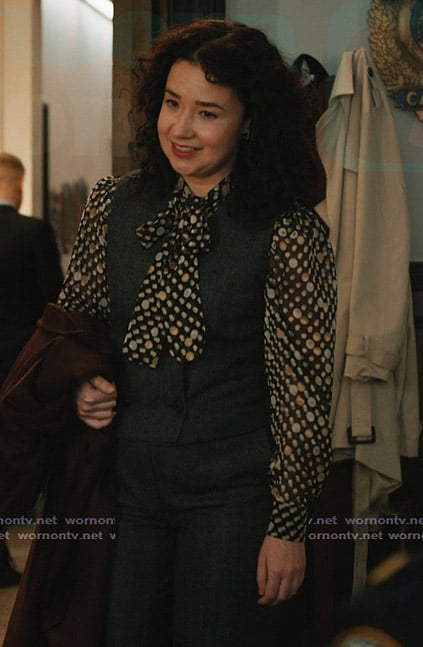 Marissa's black printed tie neck blouse on Elsbeth