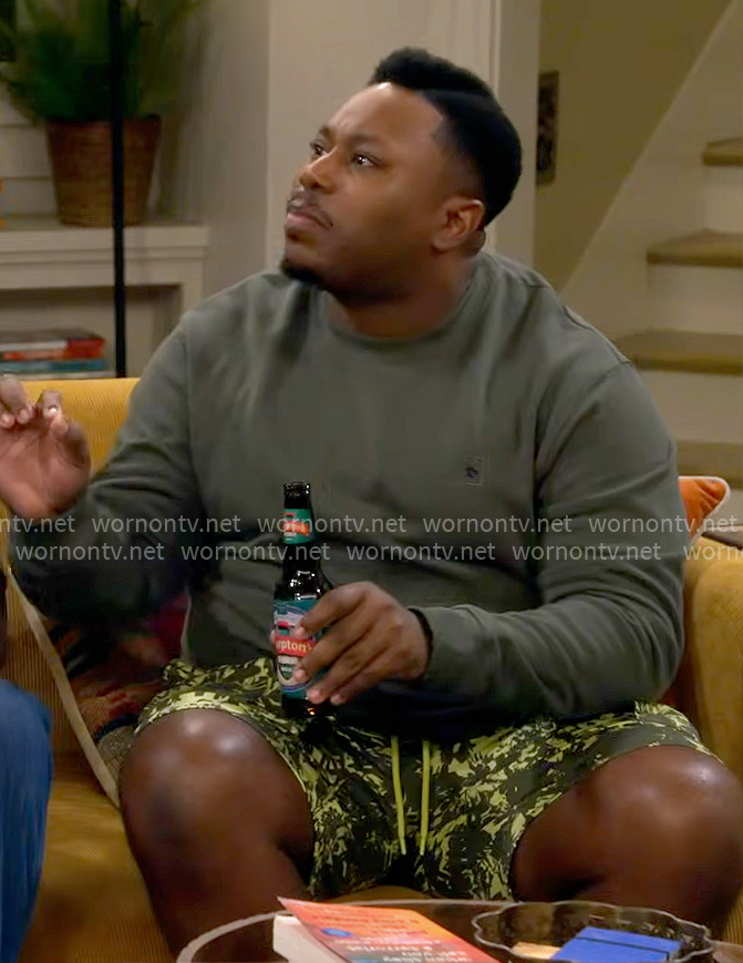 Marty's olive green sweatshirt on The Neighborhood