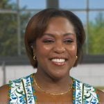 Maya Feller’s white floral print v-neck dress on Good Morning America