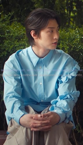 Min Ho’s blue ruffle sleeve shirt on XO Kitty