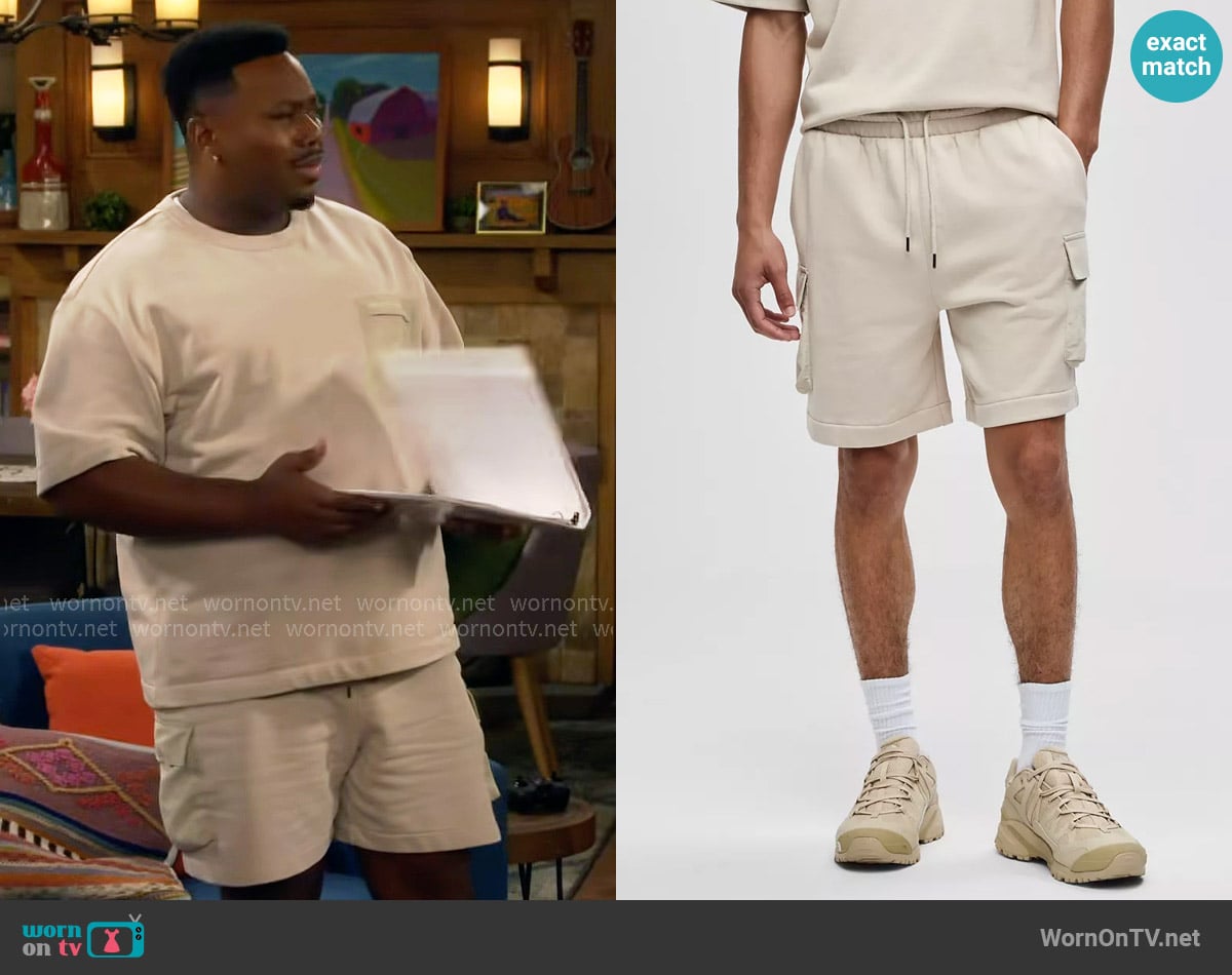Mode of One French Terry Cargo Shorts in Dark Ecru worn by Marty (Marcel Spears) on The Neighborhood