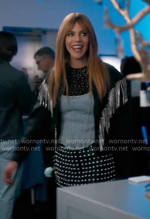 Morgan’s black embellished top, denim corset and studded skirt on High Potential