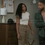 Naomi’s beige pinstripe pants on Beyond the Gates